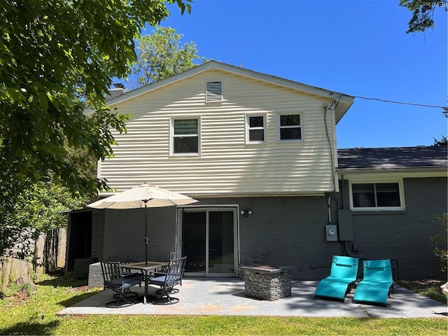 3701 Edinburgh Dr, Virginia Beach, VA 23452 - back of property with a patio area and brick siding