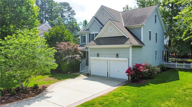 view of property exterior featuring a shingled roof, driveway, and a garage