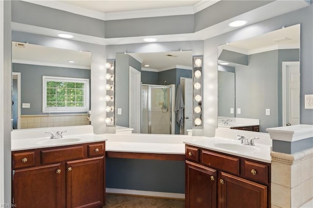 bathroom with a stall shower, ornamental molding, two vanities, recessed lighting, and tile patterned flooring