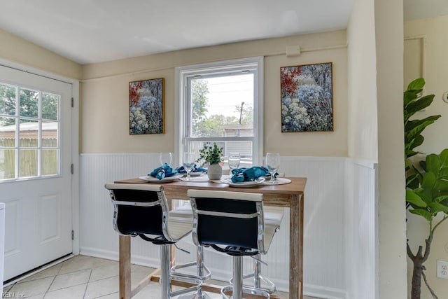 903 Bethel Rd, Chesapeake, VA 23324 - tiled dining room featuring wainscoting