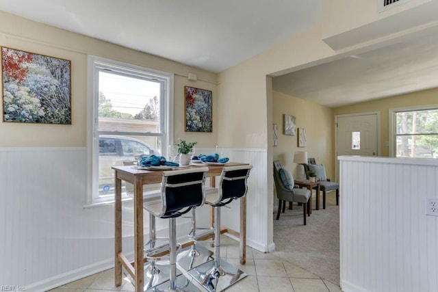 903 Bethel Rd, Chesapeake, VA 23324 - dining space with wainscoting and light tile patterned floors