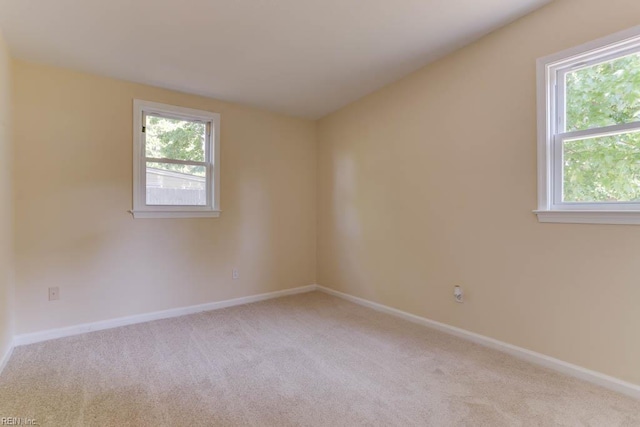903 Bethel Rd, Chesapeake, VA 23324 - unfurnished room featuring healthy amount of natural light and light carpet