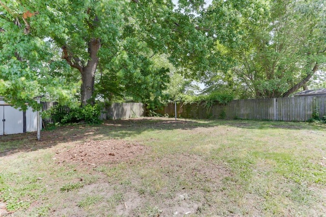 903 Bethel Rd, Chesapeake, VA 23324 - view of yard featuring a storage unit and an outdoor structure