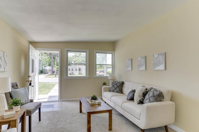 903 Bethel Rd, Chesapeake, VA 23324 - carpeted living room featuring baseboards and lofted ceiling