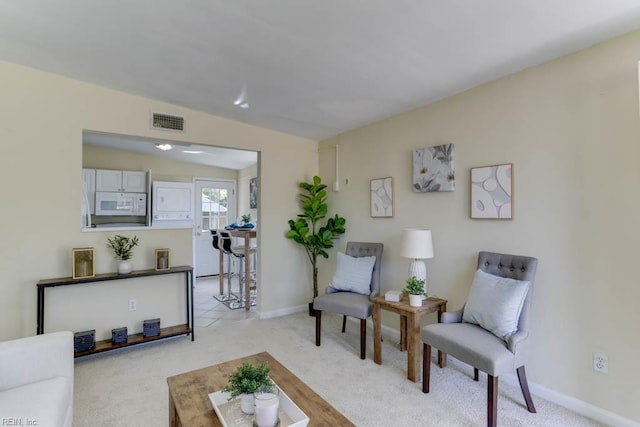 903 Bethel Rd, Chesapeake, VA 23324 - living area featuring light colored carpet and baseboards