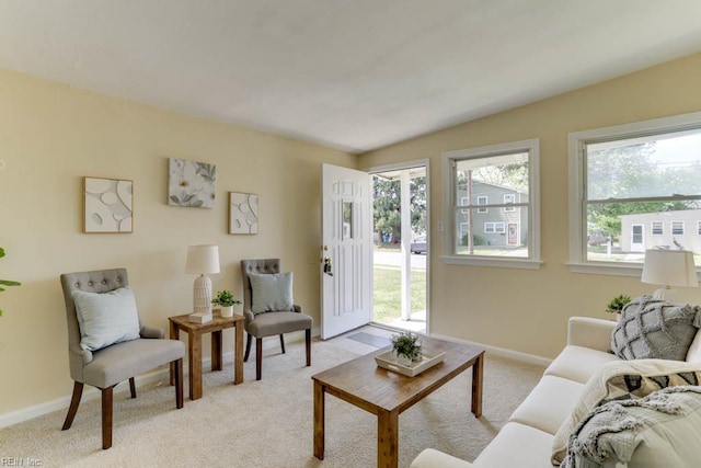 903 Bethel Rd, Chesapeake, VA 23324 - living room with healthy amount of natural light, light colored carpet, and baseboards