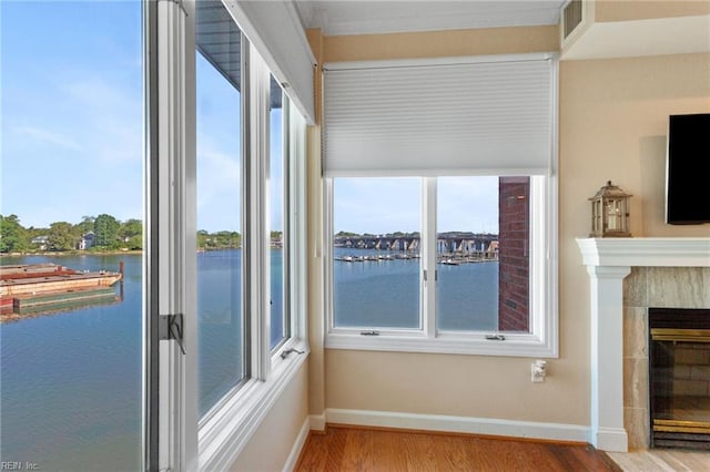 sunroom with a water view