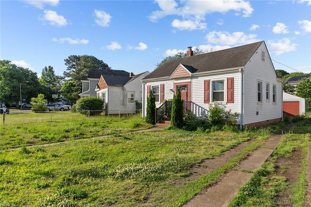 6459 Clare Rd, Norfolk, VA 23513 - view of front of house featuring a chimney and a shingled roof