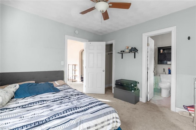 6459 Clare Rd, Norfolk, VA 23513 - carpeted bedroom featuring baseboards, connected bathroom, and a ceiling fan