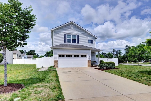 view of front facade with a garage, driveway, brick siding, and a gate