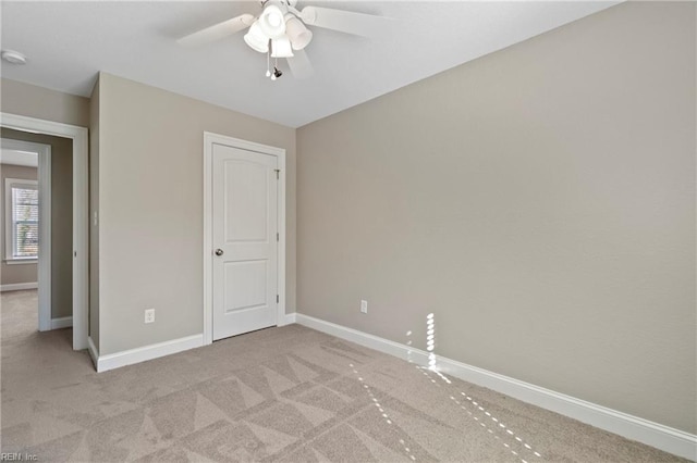 248 Pinner St, Suffolk, VA 23434 - unfurnished bedroom with light colored carpet, baseboards, and a ceiling fan