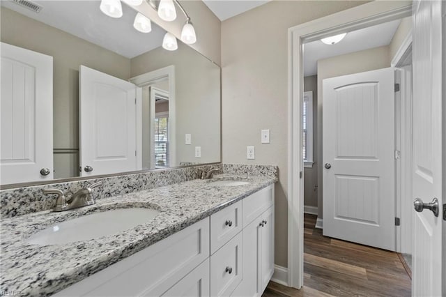 248 Pinner St, Suffolk, VA 23434 - full bathroom with wood finished floors and double vanity