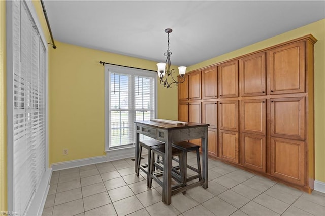 110 Lands End Dr, Elizabeth City, NC 27909 - dining room with a chandelier, baseboards, and light tile patterned floors