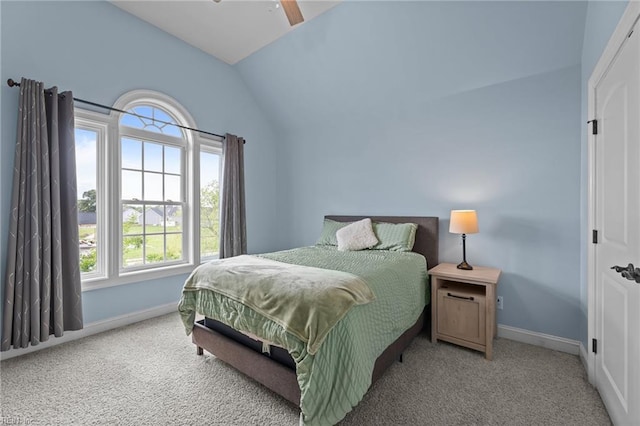 110 Lands End Dr, Elizabeth City, NC 27909 - bedroom with vaulted ceiling, multiple windows, baseboards, and carpet flooring