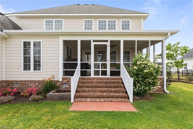 110 Lands End Dr, Elizabeth City, NC 27909 - back of property with a sunroom, roof with shingles, and entry steps