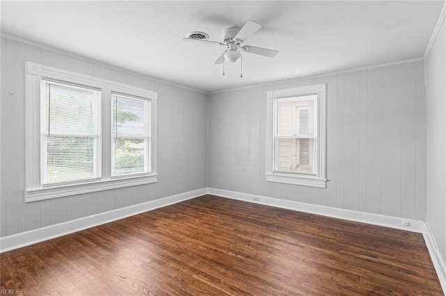 819 Lincoln St, Portsmouth, VA 23704 - spare room with dark wood-style floors, ornamental molding, baseboards, and a ceiling fan