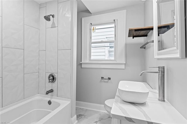 819 Lincoln St, Portsmouth, VA 23704 - bathroom with marble finish floors, toilet, baseboards, and washtub / shower combination