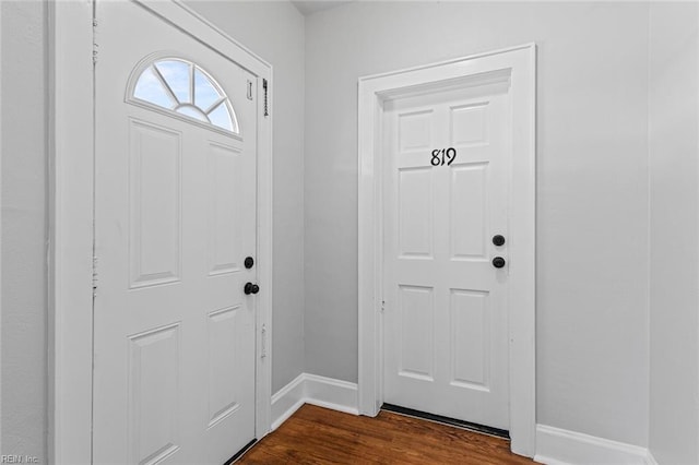 819 Lincoln St, Portsmouth, VA 23704 - entryway featuring baseboards and dark wood finished floors