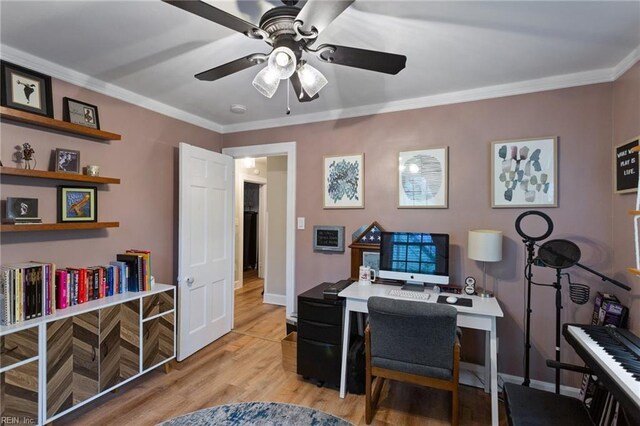 office with ceiling fan, light wood finished floors, ornamental molding, and baseboards