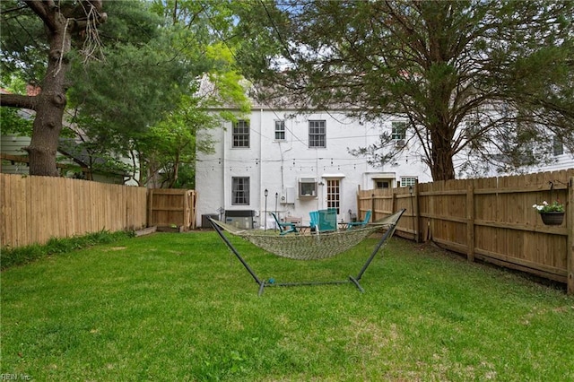 back of house featuring stucco siding and cooling unit