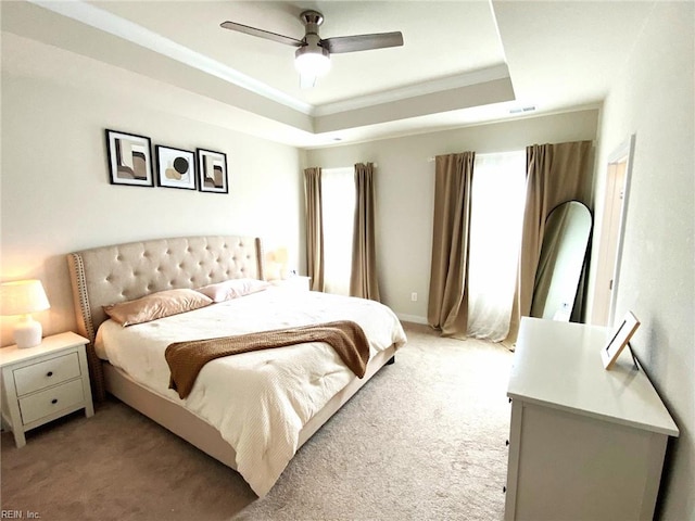 1011 Gabion Way, Chesapeake, VA 23323 - bedroom with a raised ceiling, light colored carpet, ornamental molding, and a ceiling fan