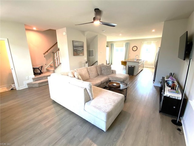 1011 Gabion Way, Chesapeake, VA 23323 - living area featuring stairway, dark wood-type flooring, a ceiling fan, baseboards, and recessed lighting