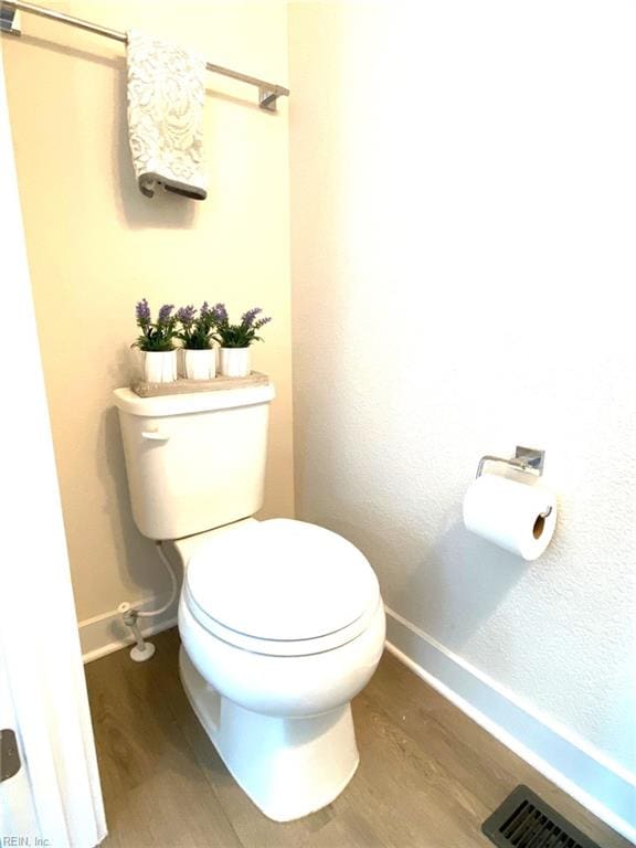1011 Gabion Way, Chesapeake, VA 23323 - bathroom featuring wood finished floors, baseboards, and toilet