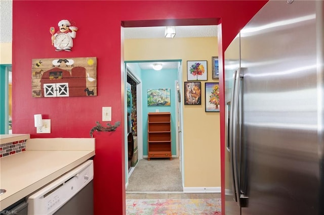 1005 Villas Ct, Virginia Beach, VA 23456 - kitchen featuring stainless steel fridge, white dishwasher, and light countertops