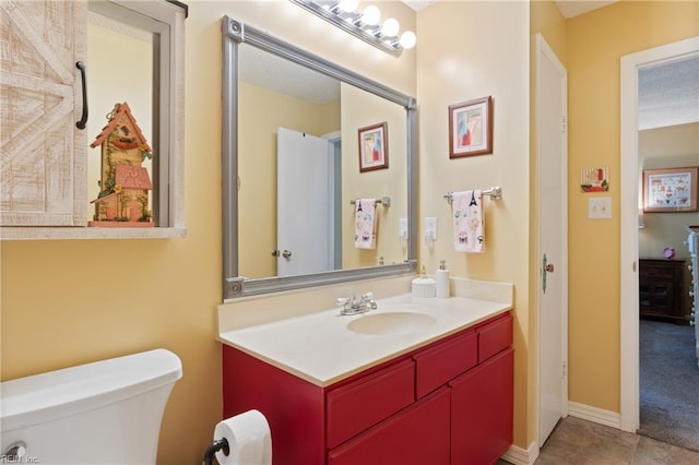 1005 Villas Ct, Virginia Beach, VA 23456 - bathroom featuring toilet, vanity, and tile patterned flooring