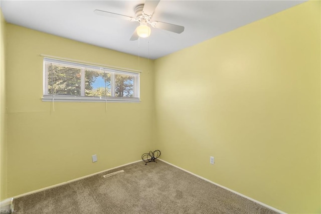 unfurnished room with carpet floors, baseboards, and ceiling fan