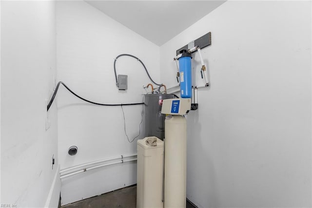 laundry room with water heater
