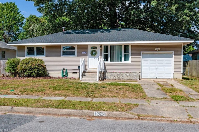 single story home featuring driveway, a garage, entry steps, and roof with shingles