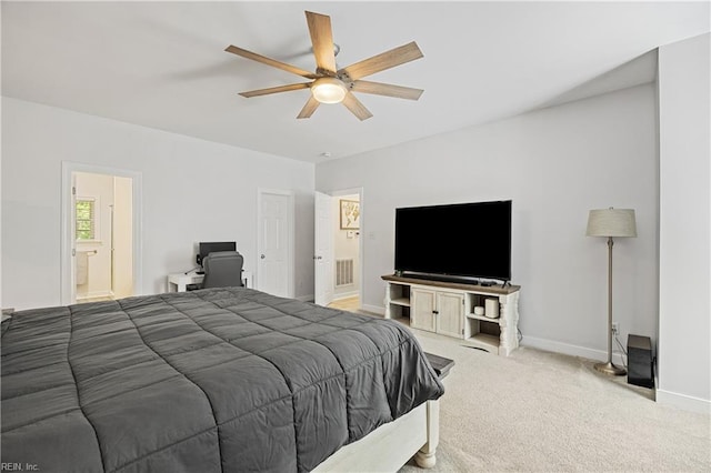 bedroom with baseboards, carpet floors, ensuite bath, and ceiling fan