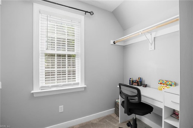 carpeted office space featuring baseboards