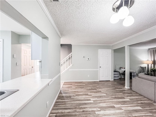 634 Biltmore Dr, Virginia Beach, VA 23454 - interior space featuring wood finished floors, stairway, a textured ceiling, ornamental molding, and baseboards