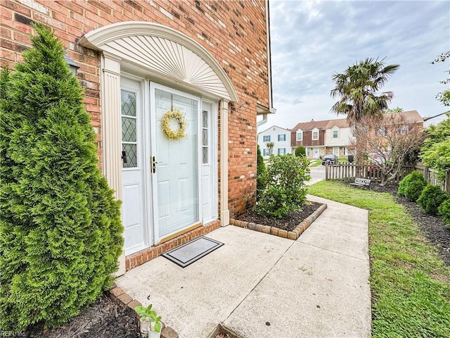 634 Biltmore Dr, Virginia Beach, VA 23454 - doorway to property with brick siding and fence