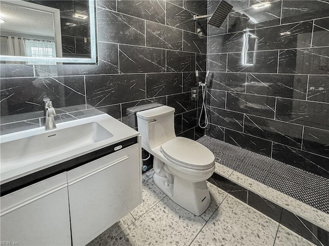 634 Biltmore Dr, Virginia Beach, VA 23454 - full bathroom with tile walls, vanity, walk in shower, and toilet