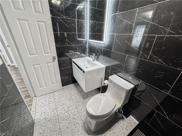 634 Biltmore Dr, Virginia Beach, VA 23454 - half bath featuring tile walls, toilet, and vanity