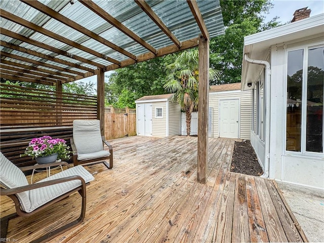 634 Biltmore Dr, Virginia Beach, VA 23454 - deck with a storage shed, an outdoor structure, and fence