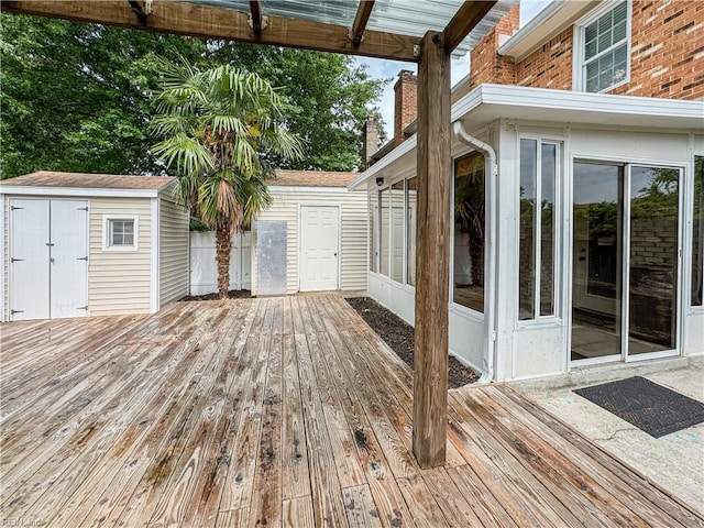 634 Biltmore Dr, Virginia Beach, VA 23454 - deck with a shed, an outbuilding, and a sunroom