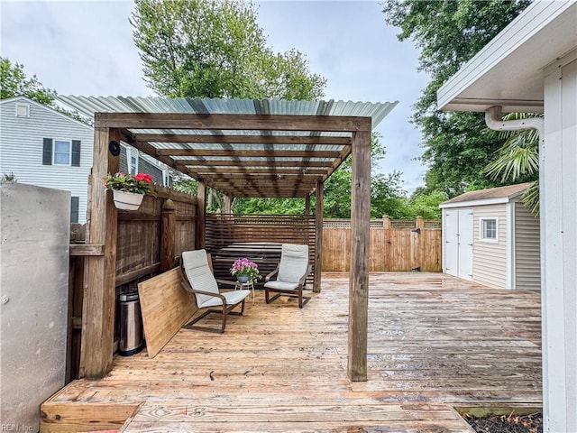 634 Biltmore Dr, Virginia Beach, VA 23454 - wooden deck featuring a fenced backyard, a pergola, a storage shed, and an outbuilding