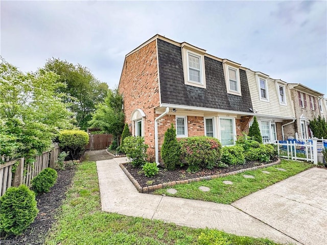 634 Biltmore Dr, Virginia Beach, VA 23454 - view of front of property featuring mansard roof, roof with shingles, and brick siding