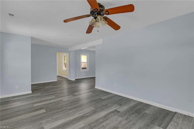 2111 Jenkins Neck Rd, Hayes, VA 23072 - spare room featuring baseboards, a ceiling fan, and wood finished floors