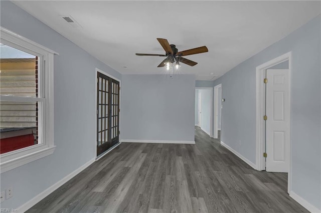 2111 Jenkins Neck Rd, Hayes, VA 23072 - spare room with wood finished floors, baseboards, and ceiling fan
