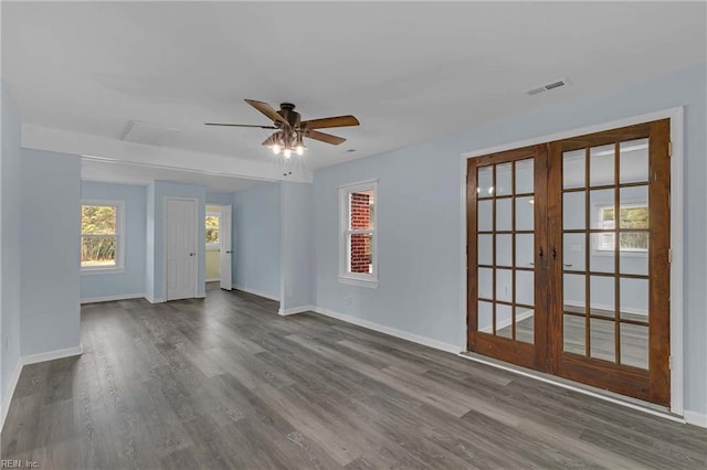 2111 Jenkins Neck Rd, Hayes, VA 23072 - spare room featuring french doors, baseboards, and wood finished floors