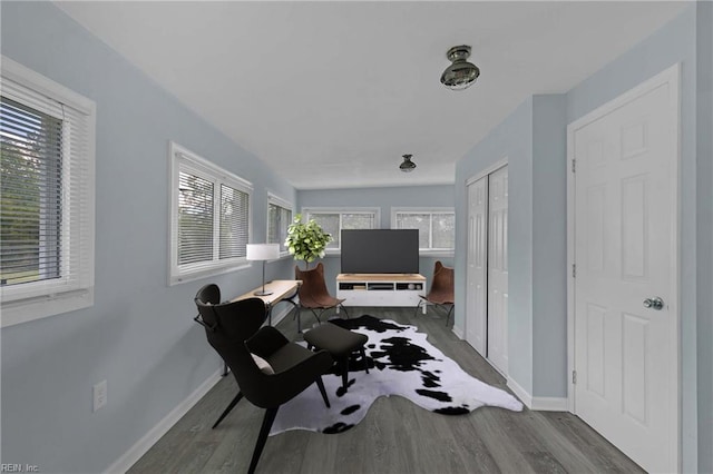 2111 Jenkins Neck Rd, Hayes, VA 23072 - sitting room with wood finished floors and baseboards