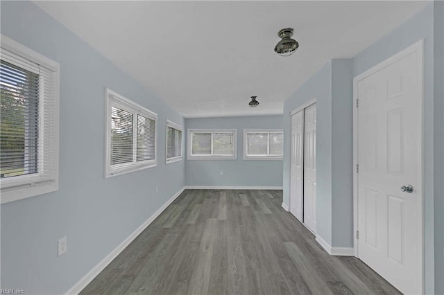 2111 Jenkins Neck Rd, Hayes, VA 23072 - hallway featuring wood finished floors and baseboards