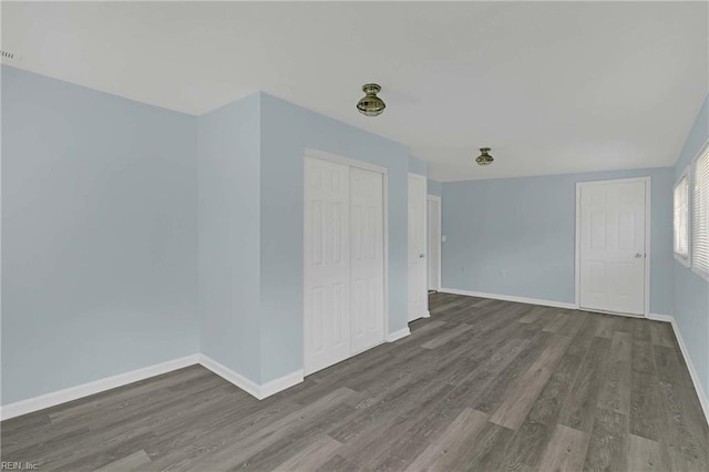 2111 Jenkins Neck Rd, Hayes, VA 23072 - unfurnished room featuring wood finished floors and baseboards