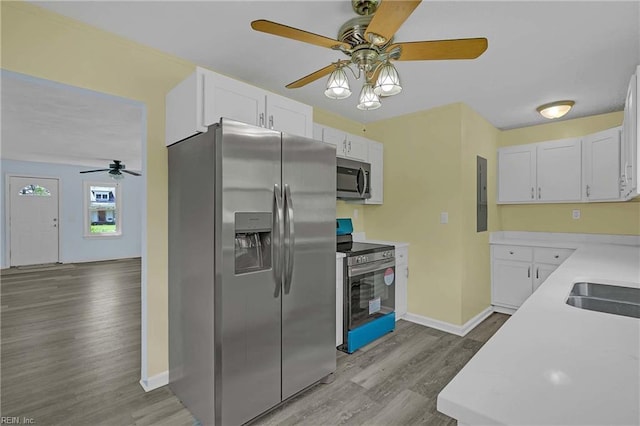 2111 Jenkins Neck Rd, Hayes, VA 23072 - kitchen featuring stainless steel appliances, ceiling fan, baseboards, wood finished floors, and white cabinetry