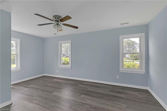 2111 Jenkins Neck Rd, Hayes, VA 23072 - empty room featuring baseboards, dark wood-style flooring, and a ceiling fan
